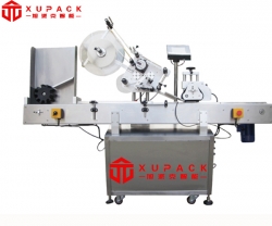 臥式圓瓶自動貼標(biāo)款YK-215